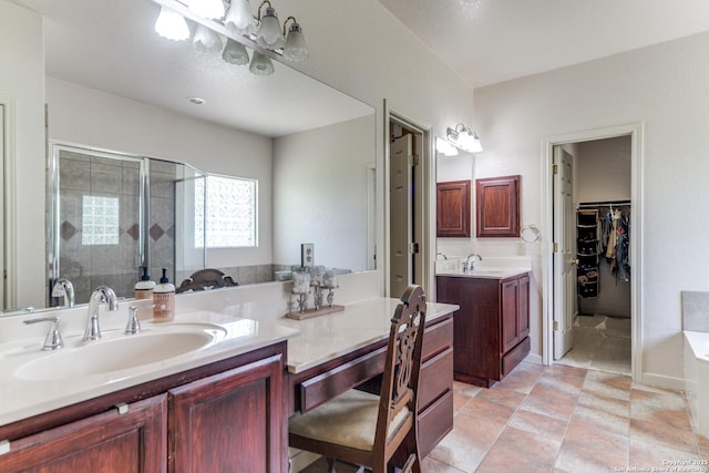 15311 Tamaron Pass, San Antonio, TX 78253 - bathroom with a shower stall, vanity, a spacious closet, and a garden tub