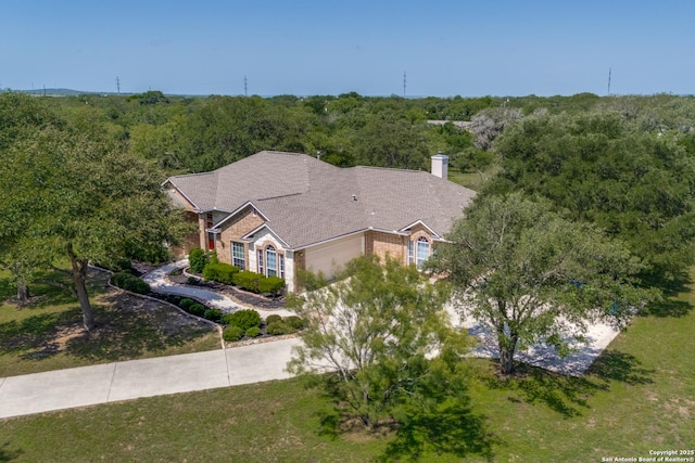 15311 Tamaron Pass, San Antonio, TX 78253 - view of subject property featuring a heavily wooded area
