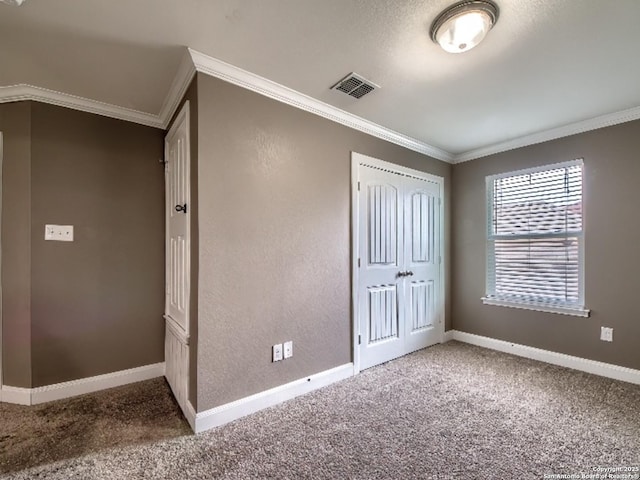 7566 Copper Cv, Converse, TX 78109 - unfurnished bedroom with carpet floors, crown molding, and a closet