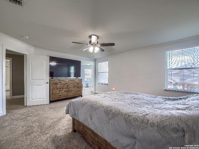 7566 Copper Cv, Converse, TX 78109 - bedroom with carpet flooring, ornamental molding, and a ceiling fan