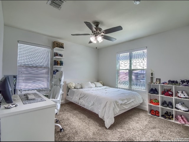 7566 Copper Cv, Converse, TX 78109 - bedroom featuring carpet floors, ceiling fan, and a desk