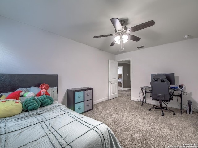 7566 Copper Cv, Converse, TX 78109 - carpeted bedroom featuring a ceiling fan and an office area