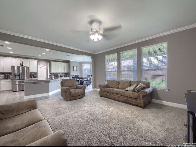 7566 Copper Cv, Converse, TX 78109 - living room with crown molding, ceiling fan, plenty of natural light, and carpet floors