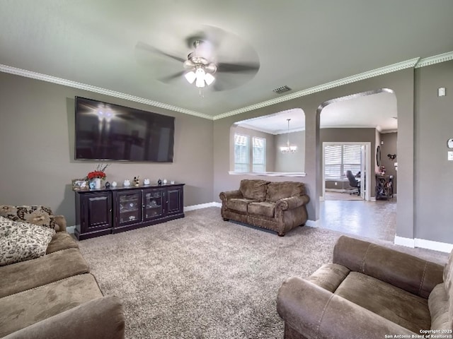 7566 Copper Cv, Converse, TX 78109 - living area featuring ornamental molding, a ceiling fan, arched walkways, and carpet flooring