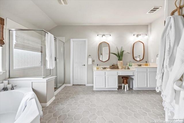 25702 Coleus, San Antonio, TX 78261 - bathroom with a shower stall, double vanity, a bath, tile patterned floors, and lofted ceiling