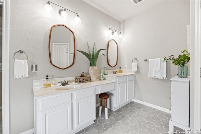 25702 Coleus, San Antonio, TX 78261 - bathroom featuring double vanity and tile patterned flooring