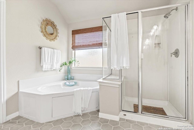 25702 Coleus, San Antonio, TX 78261 - full bathroom featuring a stall shower, a garden tub, tile patterned floors, and lofted ceiling