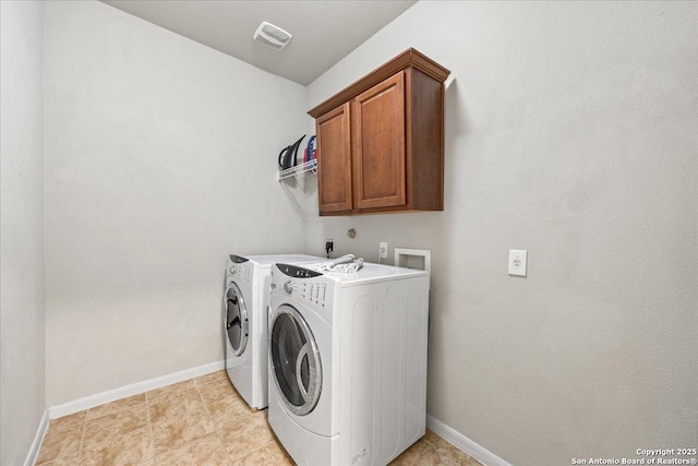 25702 Coleus, San Antonio, TX 78261 - washroom with cabinet space and washing machine and clothes dryer