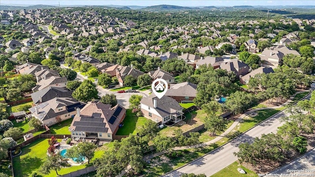 25702 Coleus, San Antonio, TX 78261 - aerial view of property and surrounding area with nearby suburban area and a mountainous background