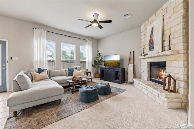 25702 Coleus, San Antonio, TX 78261 - living area with a fireplace, a ceiling fan, and carpet