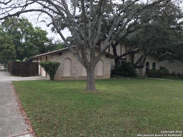 9218 Woodheather, San Antonio, TX 78254 - view of property exterior with brick siding and driveway