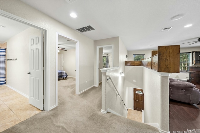 20630 Creek Riv, San Antonio, TX 78259 - hallway with an upstairs landing, light carpet, and recessed lighting