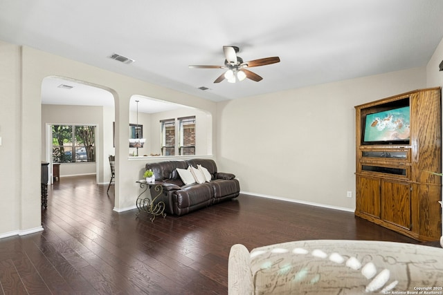 20630 Creek Riv, San Antonio, TX 78259 - living area with a ceiling fan, arched walkways, and wood finished floors