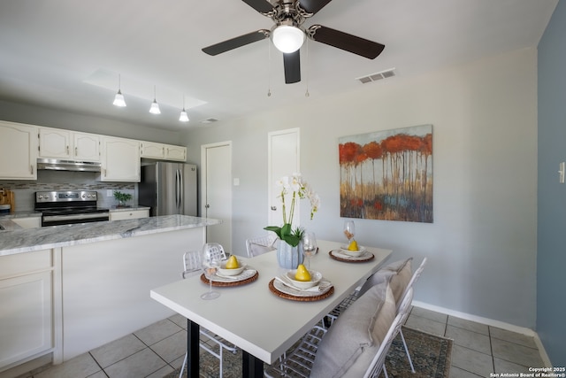 3719 Pipers Rdg, San Antonio, TX 78251 - dining room with light tile patterned flooring and ceiling fan