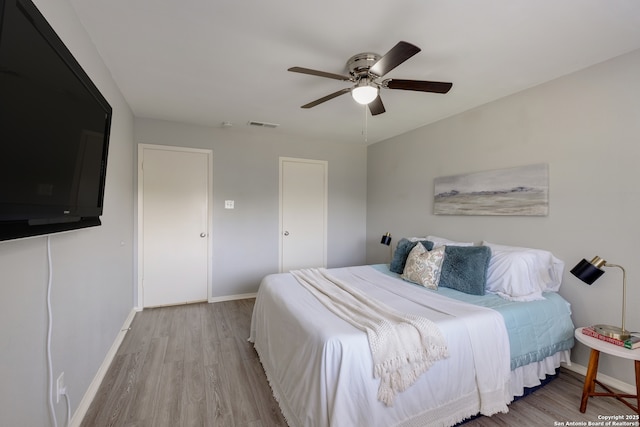 3719 Pipers Rdg, San Antonio, TX 78251 - bedroom with wood finished floors and a ceiling fan