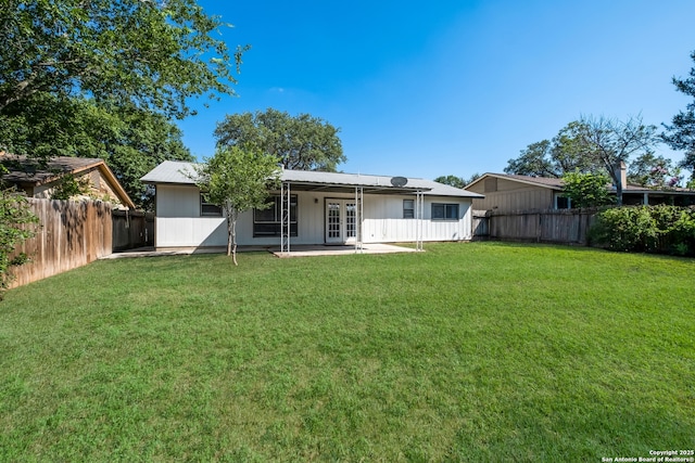 3719 Pipers Rdg, San Antonio, TX 78251 - back of house with french doors, a fenced backyard, and a patio