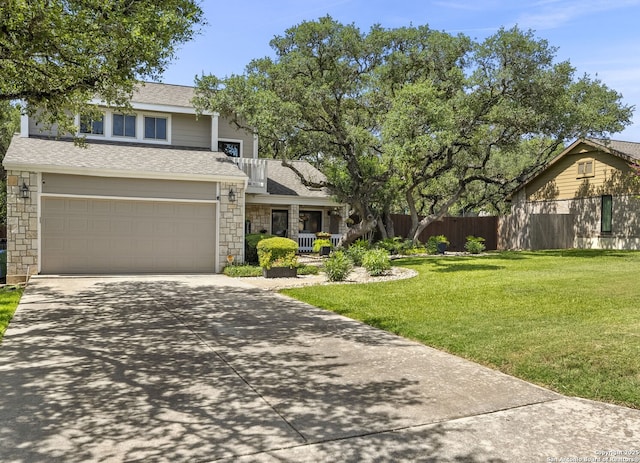 2026 Encino Vista St, San Antonio, TX 78259 - view of front of home featuring driveway, stone siding, roof with shingles, and a garage