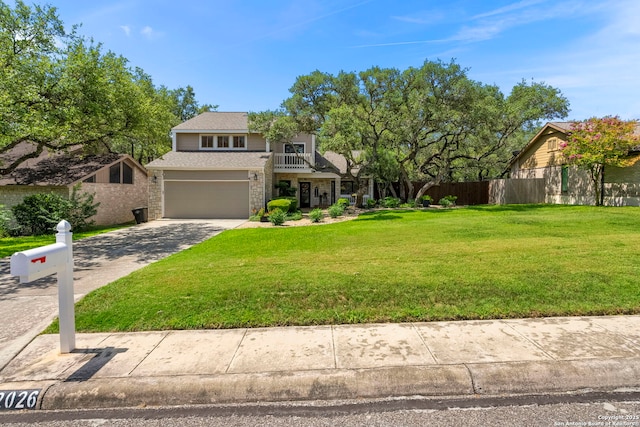 2026 Encino Vista St, San Antonio, TX 78259 - view of front facade with stone siding, concrete driveway, a balcony, and a garage