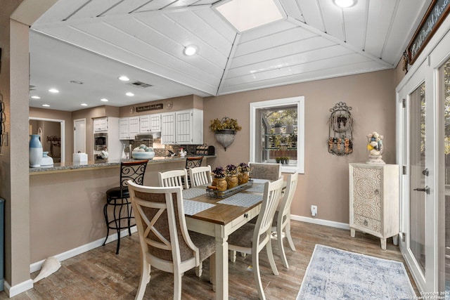 2026 Encino Vista St, San Antonio, TX 78259 - dining space with light wood-type flooring, recessed lighting, and vaulted ceiling