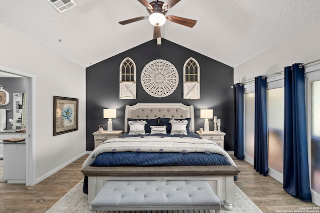 2026 Encino Vista St, San Antonio, TX 78259 - bedroom with vaulted ceiling, wood finished floors, ceiling fan, and a textured ceiling