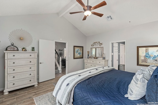2026 Encino Vista St, San Antonio, TX 78259 - bedroom featuring wood finished floors, beam ceiling, high vaulted ceiling, and ceiling fan
