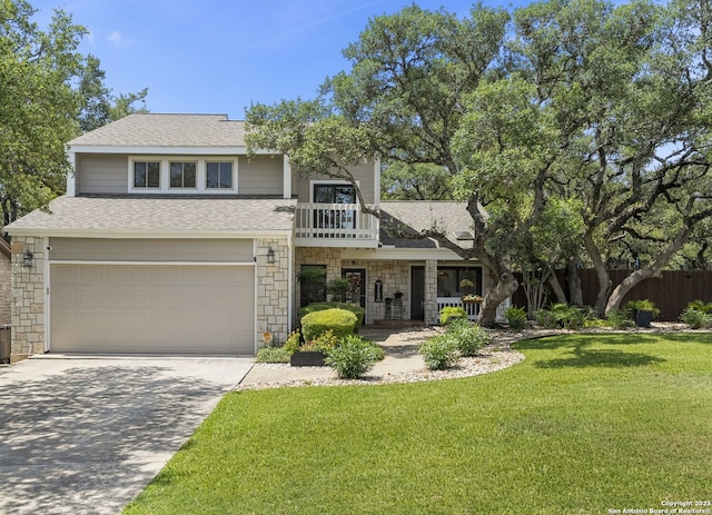 2026 Encino Vista St, San Antonio, TX 78259 - view of front of house featuring stone siding, a balcony, driveway, an attached garage, and a shingled roof