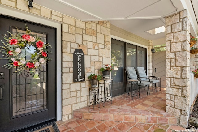 2026 Encino Vista St, San Antonio, TX 78259 - entrance to property featuring stone siding and a porch