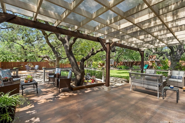 2026 Encino Vista St, San Antonio, TX 78259 - fenced backyard with outdoor lounge area, a pergola, and a patio