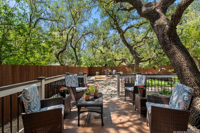 2026 Encino Vista St, San Antonio, TX 78259 - wooden terrace featuring outdoor lounge area and a fenced backyard