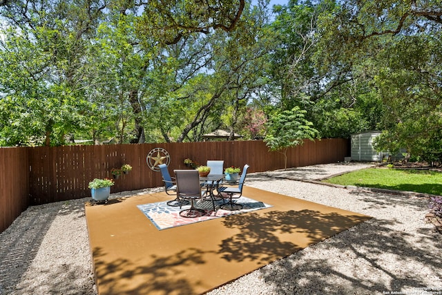 2026 Encino Vista St, San Antonio, TX 78259 - fenced backyard with a patio and outdoor dining space