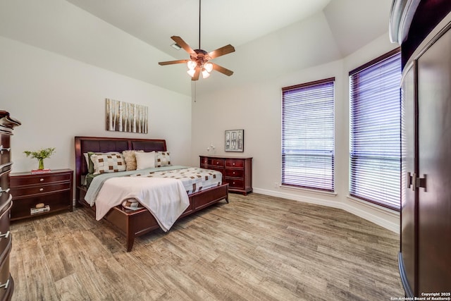 139 Sable Hts, San Antonio, TX 78258 - bedroom featuring vaulted ceiling, light wood-style floors, and ceiling fan