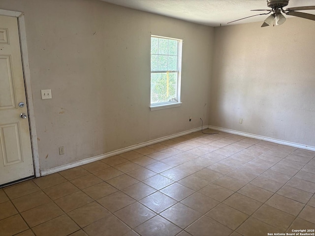 394 Dorie, San Antonio, TX 78220 - tiled empty room with a ceiling fan and a textured ceiling