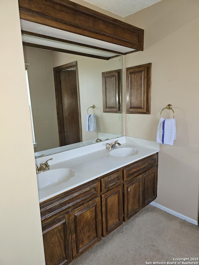 14107 Moss Farm, San Antonio, TX 78231 - full bathroom featuring double vanity and baseboards