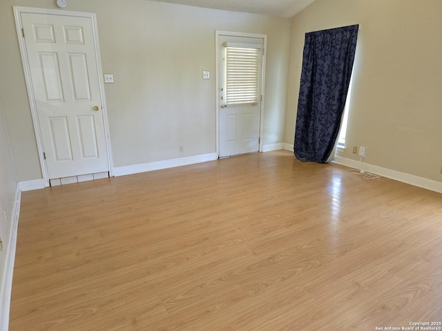 14107 Moss Farm, San Antonio, TX 78231 - empty room with light wood-style flooring and baseboards