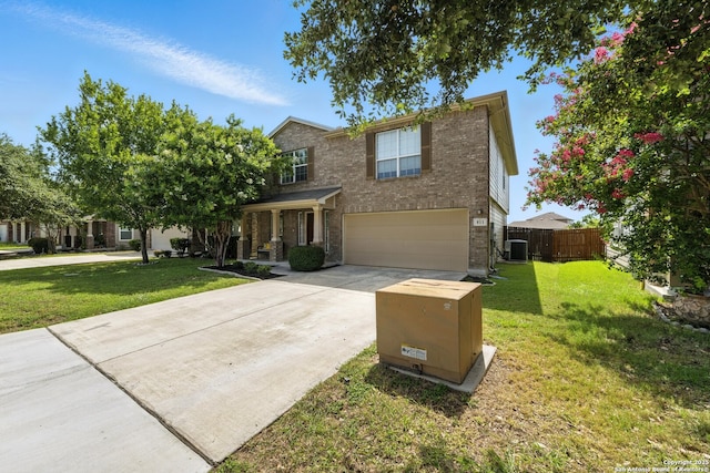 811 Cormorant, San Antonio, TX 78245 - view of front of property featuring an attached garage, driveway, brick siding, and a porch