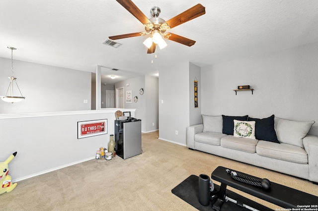 811 Cormorant, San Antonio, TX 78245 - carpeted living area featuring ceiling fan and baseboards