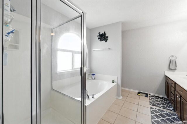 811 Cormorant, San Antonio, TX 78245 - bathroom with a stall shower, vanity, and a bath