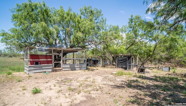 114 Pace Miller, Del Rio, TX 78840 - view of yard with exterior structure and an outbuilding