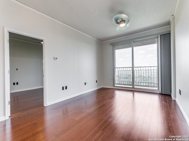 1 Towers Park Unit 1803, San Antonio, TX 78209 - spare room featuring dark wood-style floors and crown molding