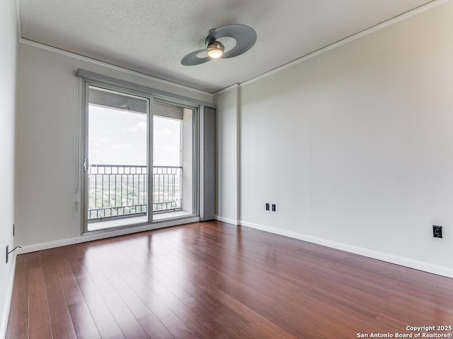 1 Towers Park Unit 1803, San Antonio, TX 78209 - unfurnished room featuring crown molding, dark wood-type flooring, and a ceiling fan