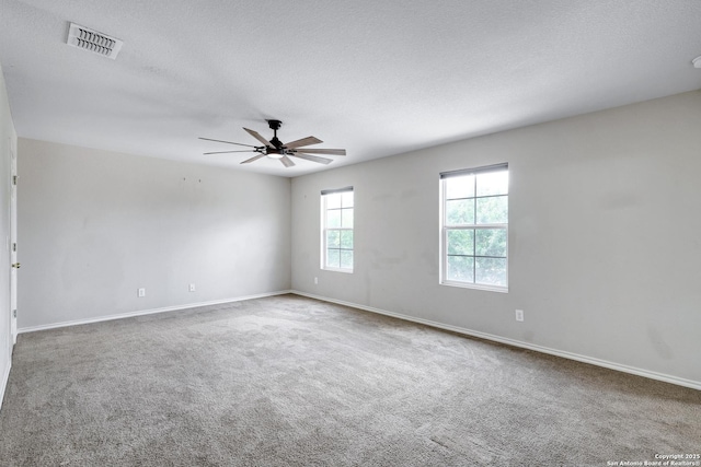 2702 Harvest Crk, San Antonio, TX 78244 - carpeted spare room with a ceiling fan and a textured ceiling