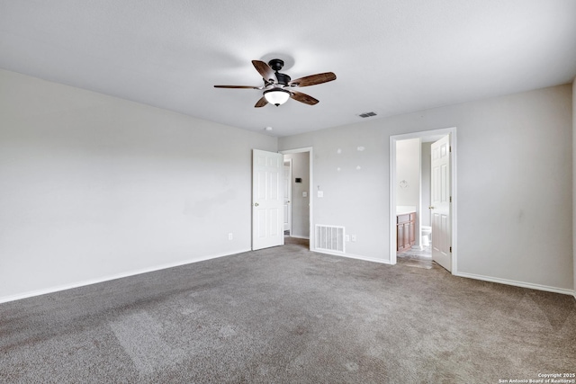 2702 Harvest Crk, San Antonio, TX 78244 - unfurnished bedroom with carpet flooring, connected bathroom, and ceiling fan