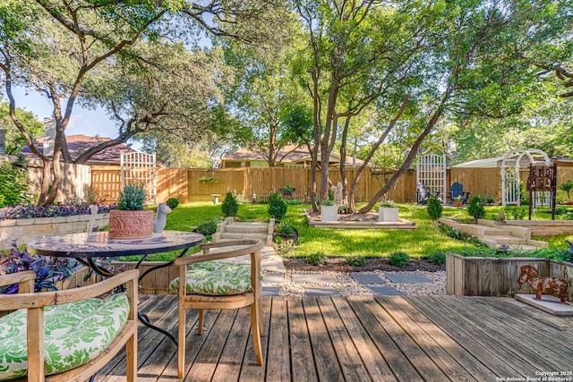 13947 Amber Crst, San Antonio, TX 78249 - deck with a fenced backyard and outdoor dining area