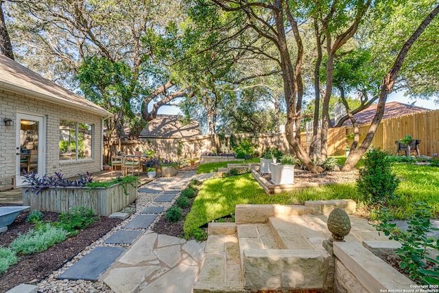 13947 Amber Crst, San Antonio, TX 78249 - fenced backyard with a patio
