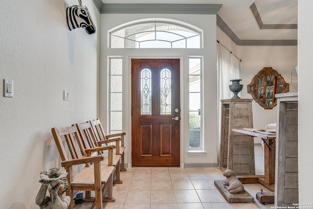 13947 Amber Crst, San Antonio, TX 78249 - entryway with crown molding, healthy amount of natural light, a textured wall, and light tile patterned floors
