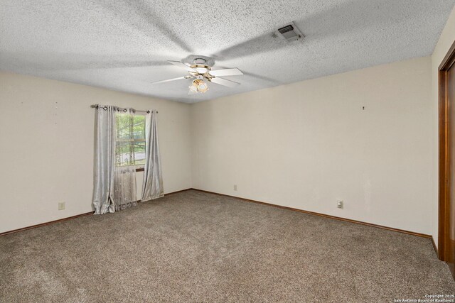 25615 Dull Knife Trl, San Antonio, TX 78255 - unfurnished room featuring a ceiling fan, carpet, and a textured ceiling