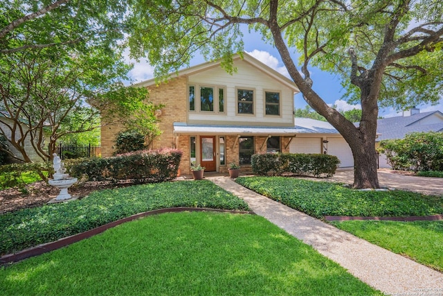 14519 Parksite Woods, San Antonio, TX 78249 - view of front of home featuring brick siding, a garage, driveway, and a porch