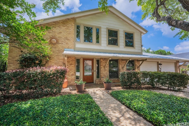 14519 Parksite Woods, San Antonio, TX 78249 - view of front of home featuring an attached garage and brick siding