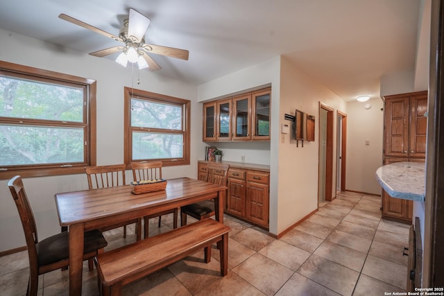 14519 Parksite Woods, San Antonio, TX 78249 - dining space with a ceiling fan and light tile patterned floors