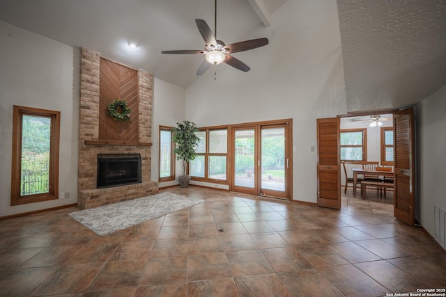 14519 Parksite Woods, San Antonio, TX 78249 - unfurnished living room featuring ceiling fan, high vaulted ceiling, and a fireplace